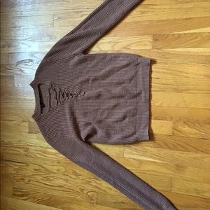 Light brown long sleeve sweater.